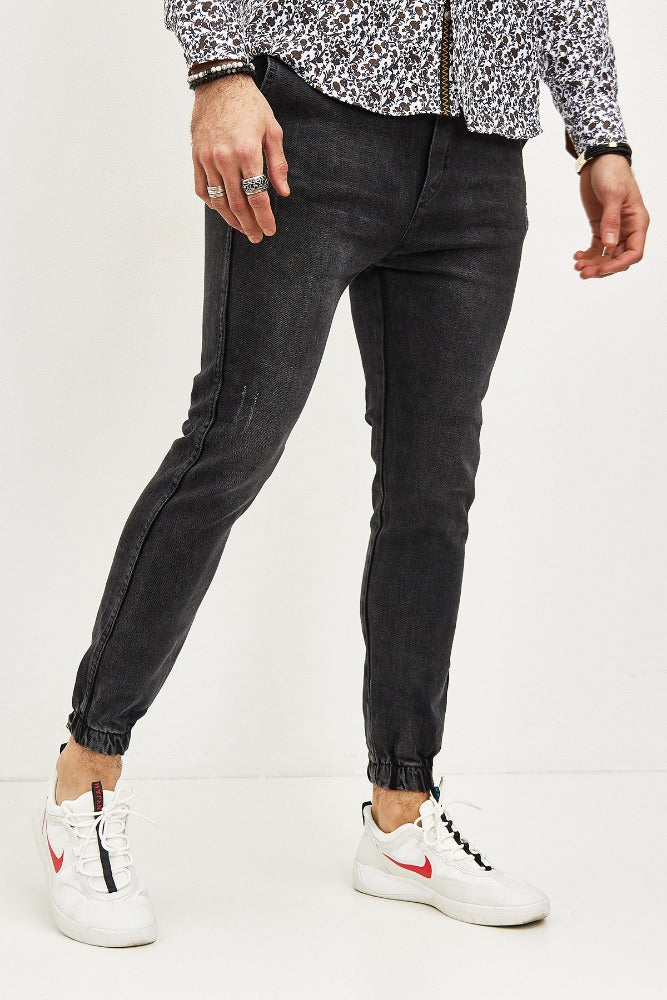 Jeans style jogger pant noir homme fashion matière souple1