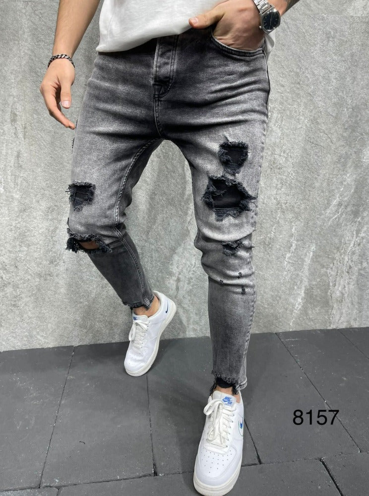 Jeans gris délavé skinny fashion avec déchirures homme