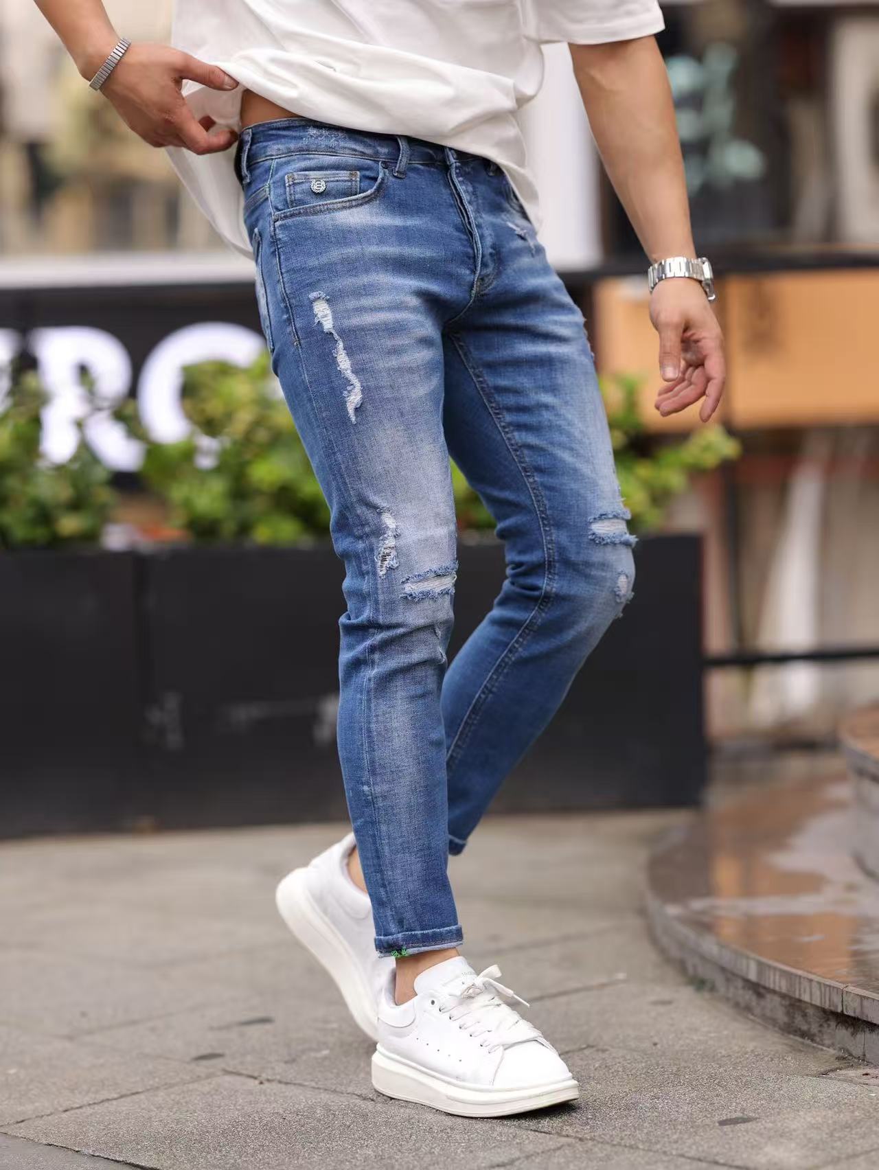 Jean slim bleu denim à déchirures fines