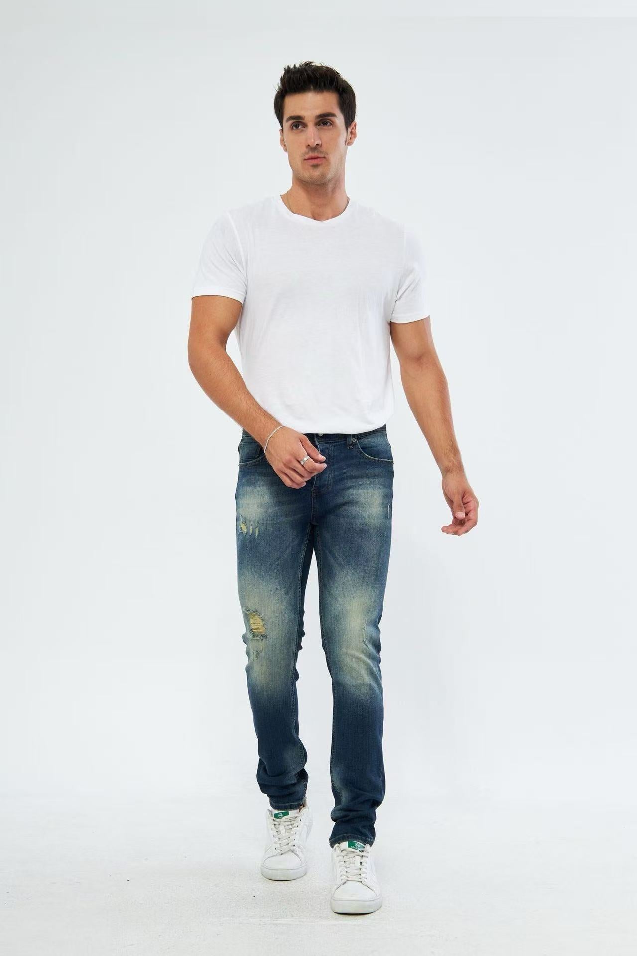 Jean slim fit bleu délavé avec détails usés pour homme