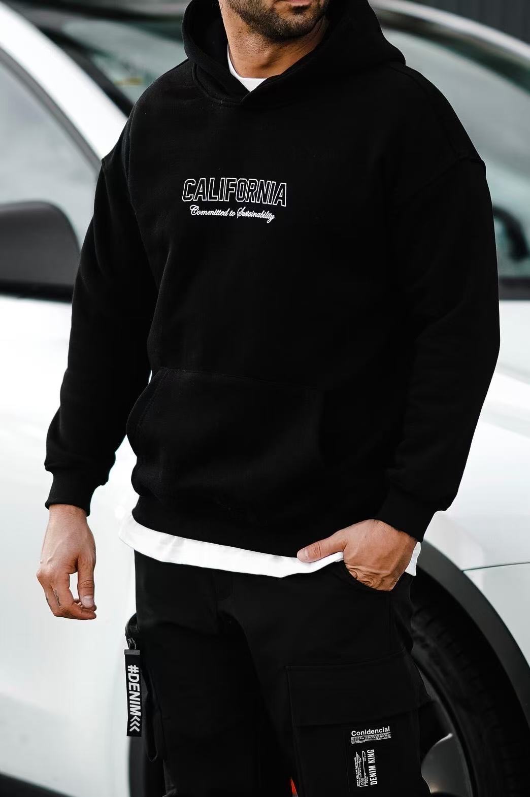 Sweat à capuche imprimé noir