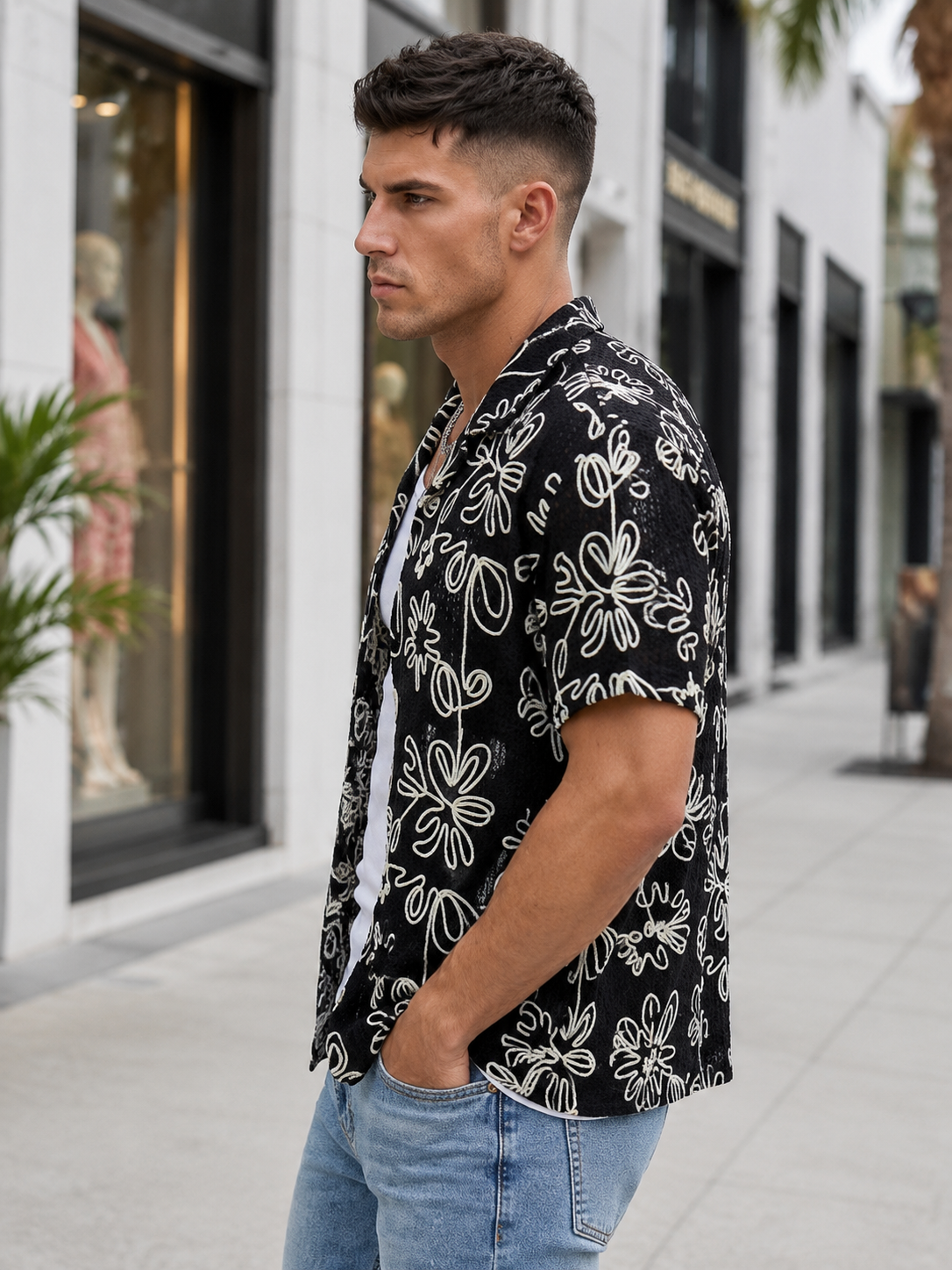 Chemise homme noire ajourée à broderies florales