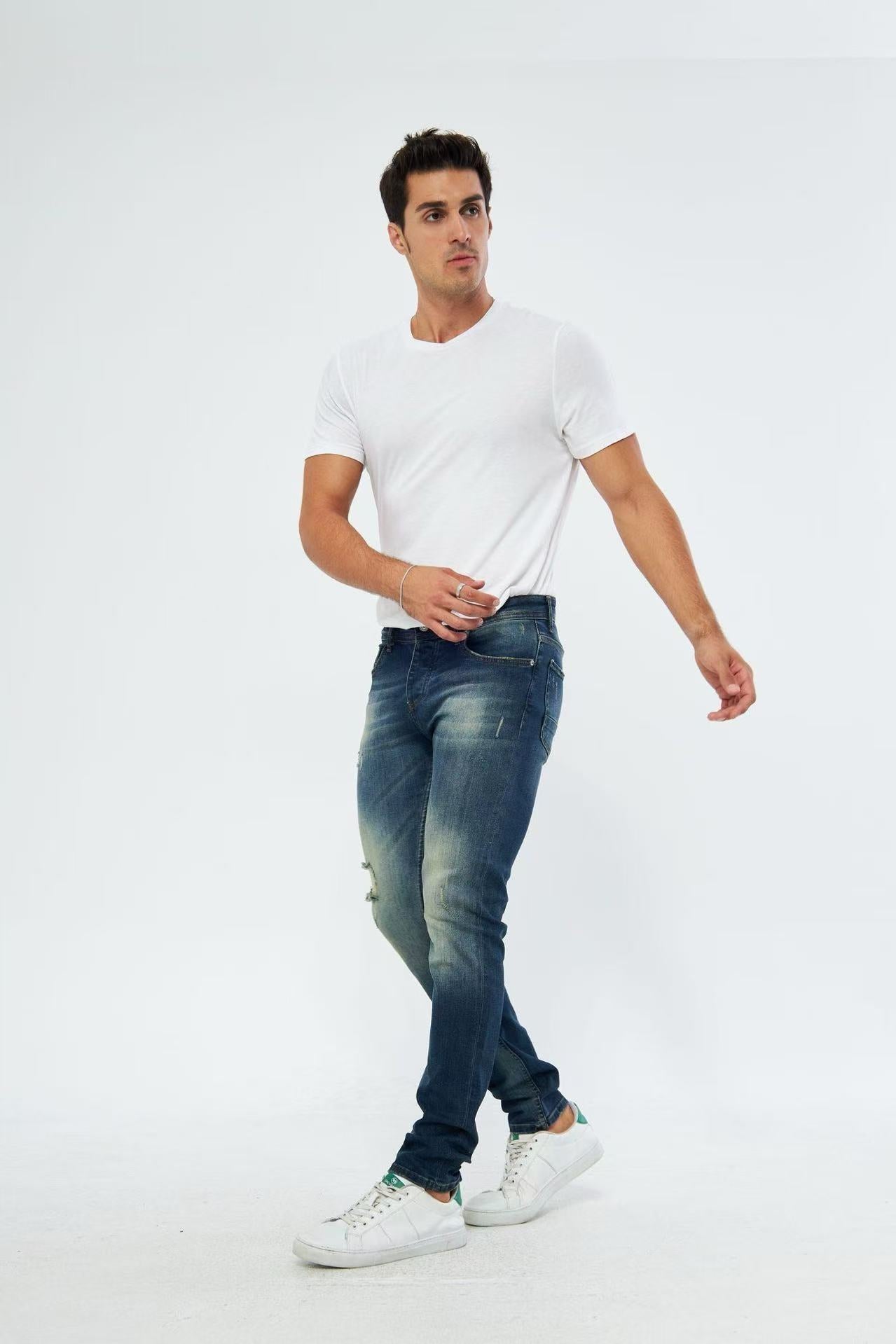 Jean slim fit bleu délavé avec détails usés pour homme