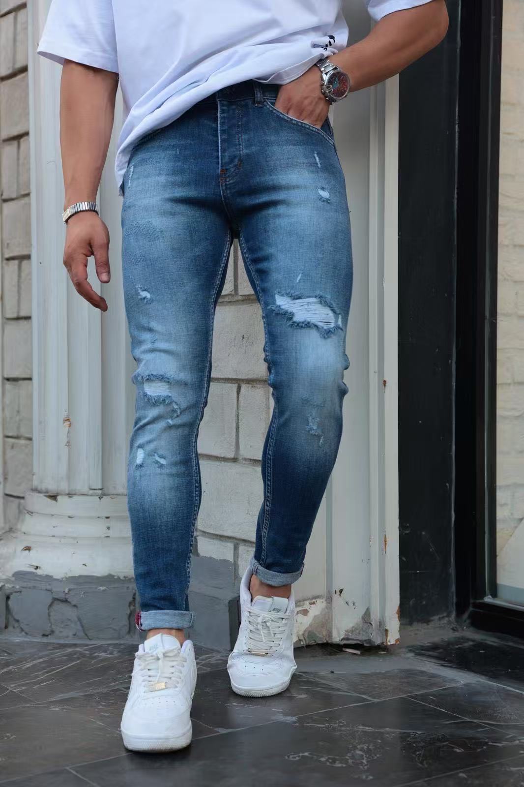 Jean slim fit bleu vintage à déchirures renforcées – Homme
