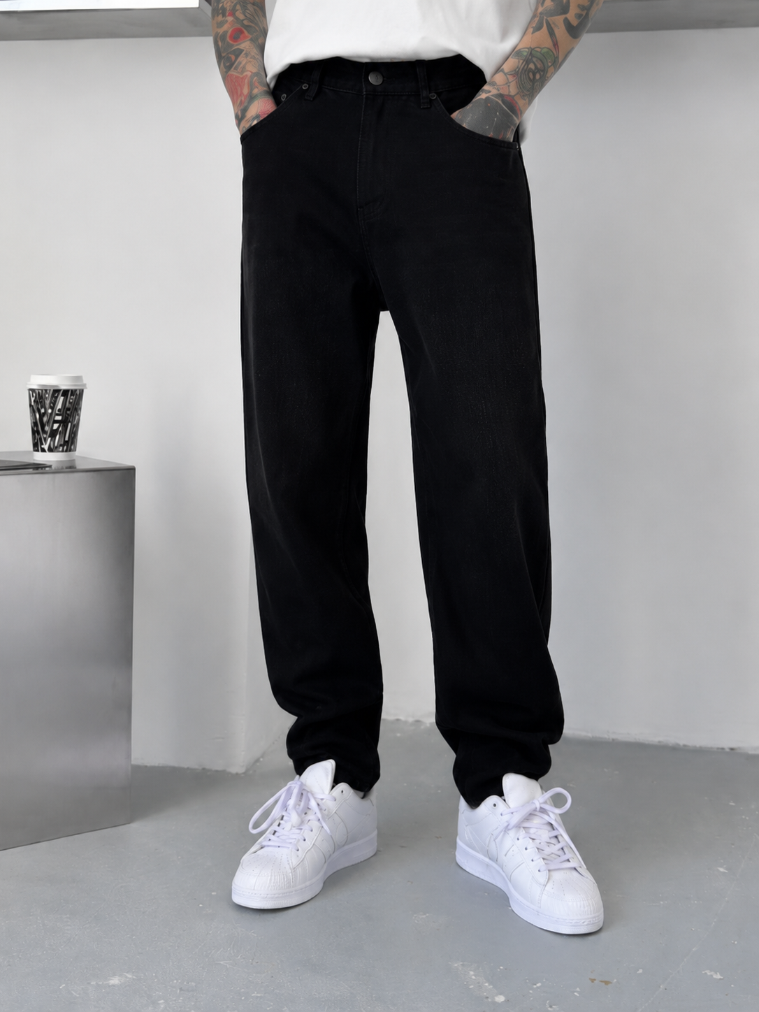 Jean homme noir coupe large délavé
