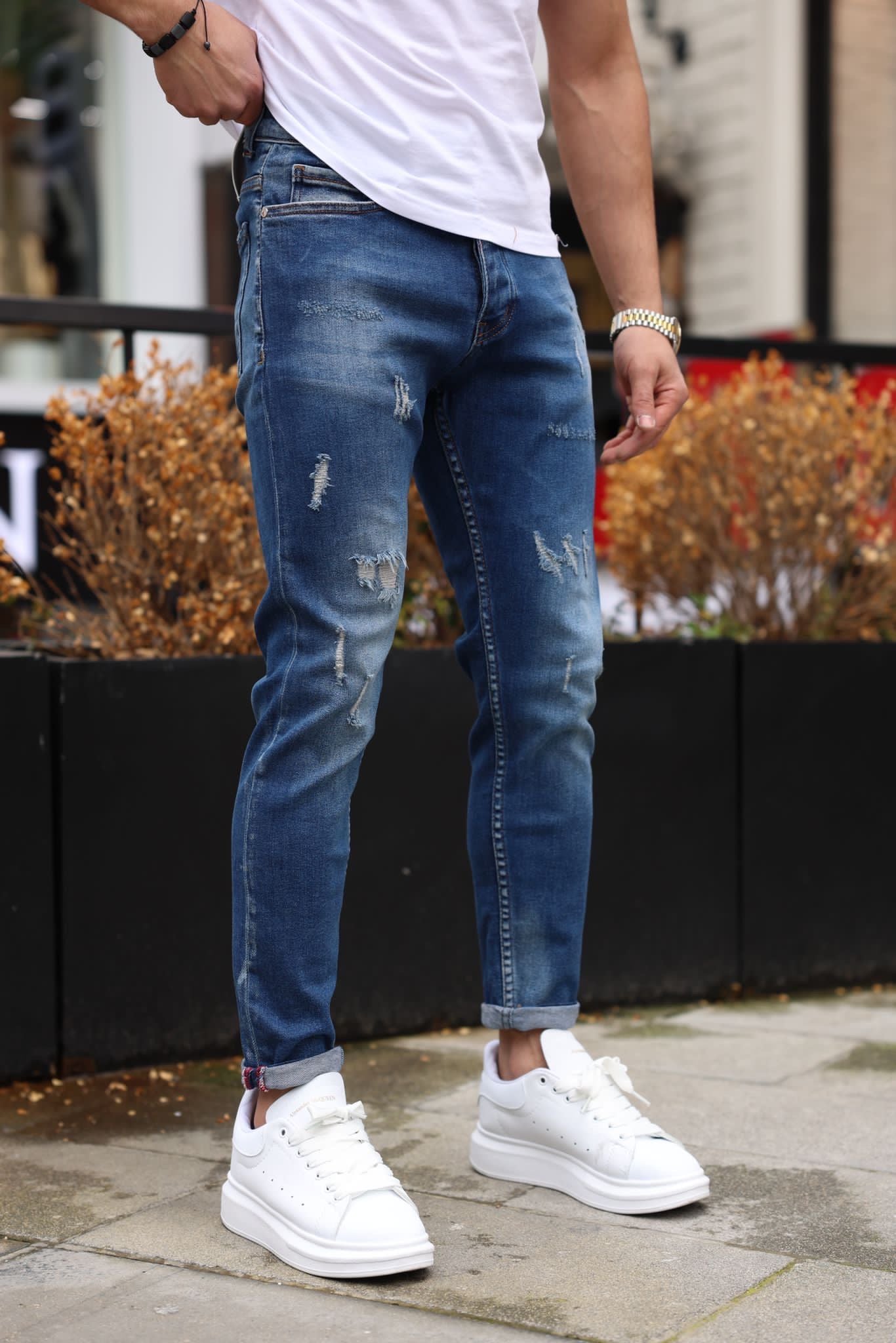 Jean bleu foncé slim effet déchiré