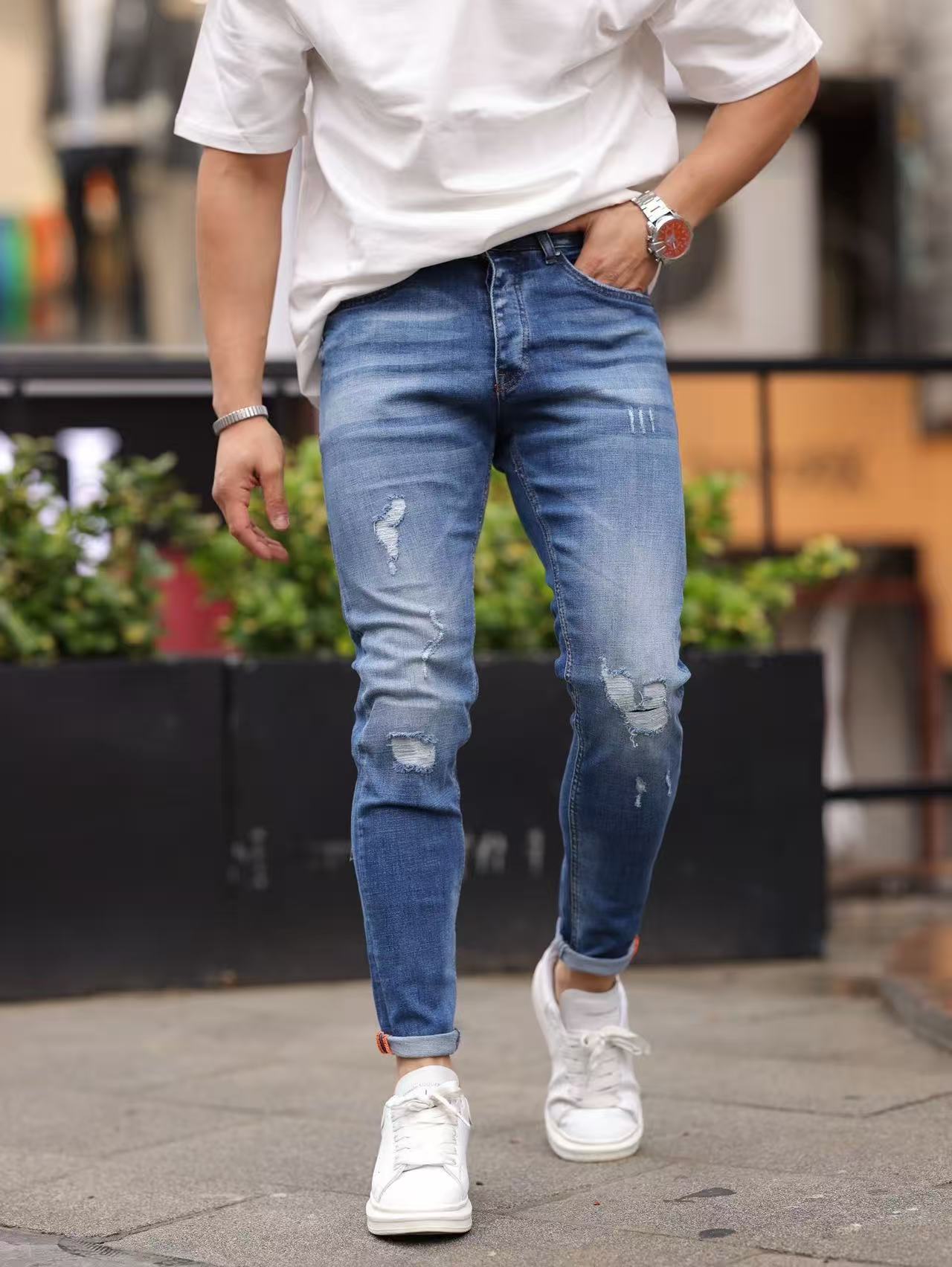 Jean slim fit bleu moyen avec détails destroy discrets – Homme