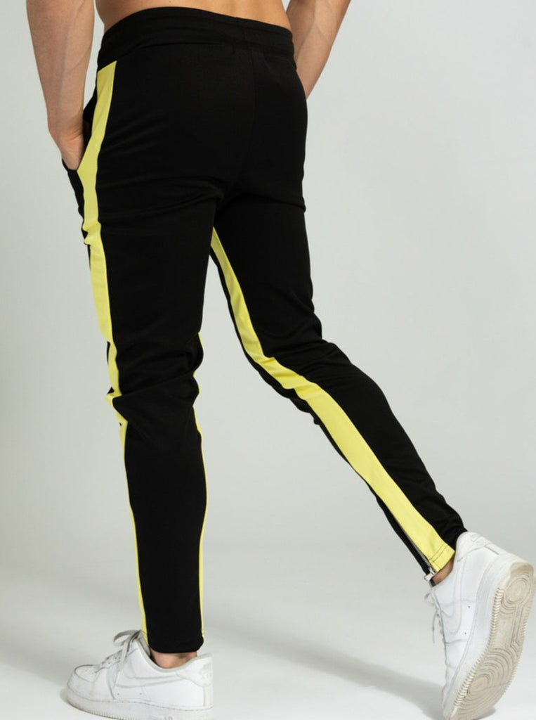 Frilivin pantalon jogging noir à bande jaune slim homme ilannfive dos