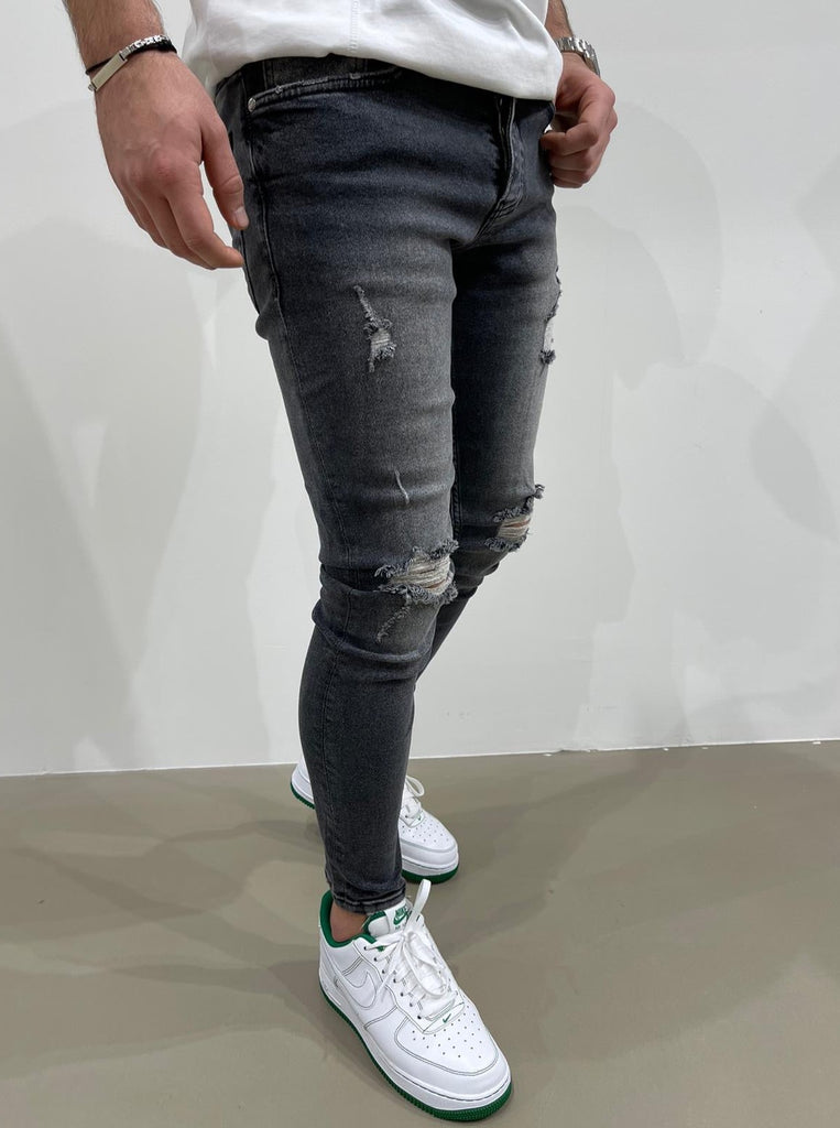 Jeans noir skinny fashion avec déchirures homme ilannfive