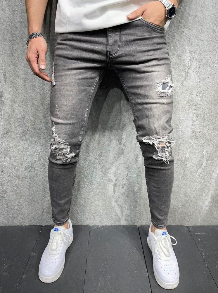 Jeans skinny gris avec déchirures sur le genoux homme ilannfive